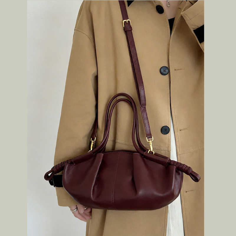 THE SCULPTURAL PLEATED DUMPLING BAG