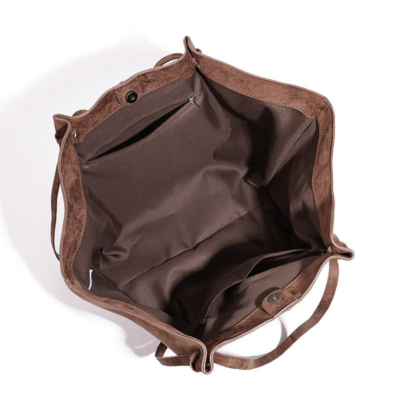 THE OVERSIZED WINGED EXECUTIVE TOTE
