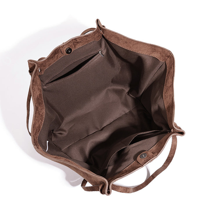 THE OVERSIZED WINGED EXECUTIVE TOTE