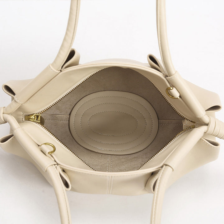THE SCULPTURAL PLEATED DUMPLING BAG