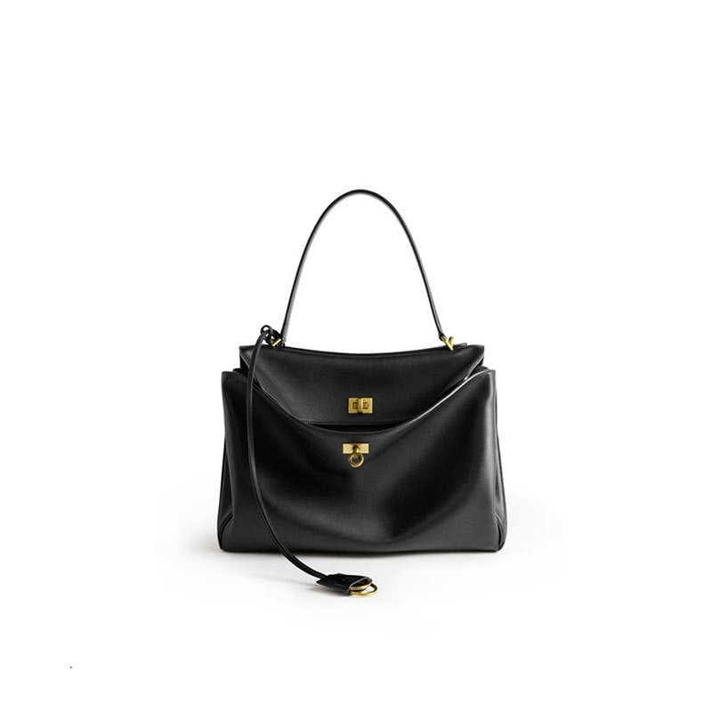 THE TRI-COMPARTMENT EXECUTIVE FLAP BAG