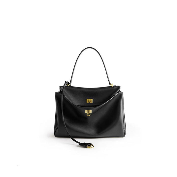 THE TRI-COMPARTMENT EXECUTIVE FLAP BAG