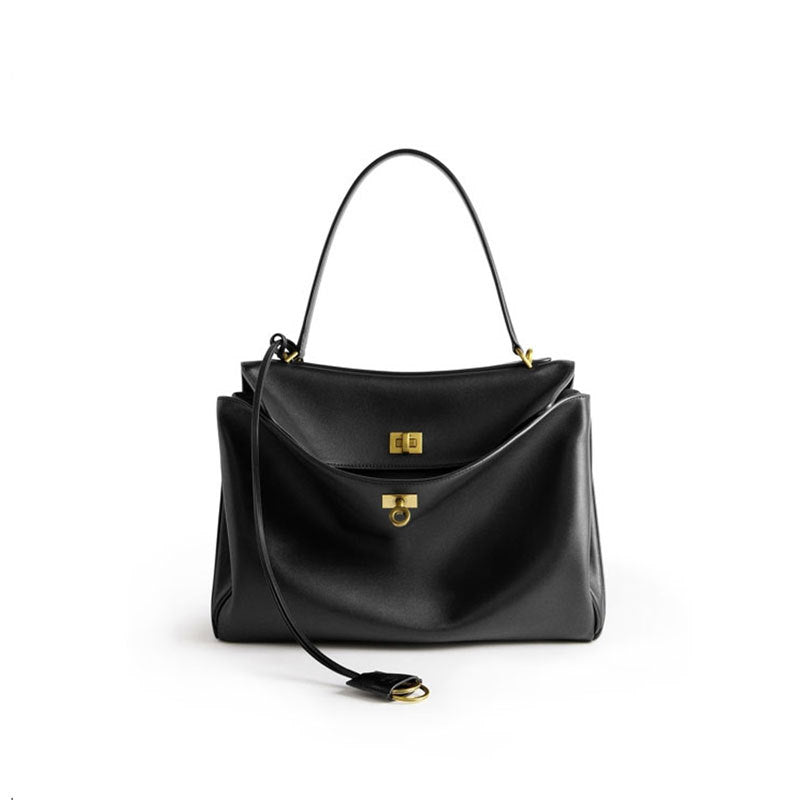 THE TRI-COMPARTMENT EXECUTIVE FLAP BAG