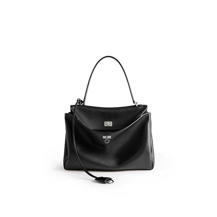 THE TRI-COMPARTMENT EXECUTIVE FLAP BAG