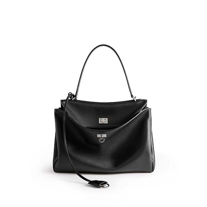 THE TRI-COMPARTMENT EXECUTIVE FLAP BAG