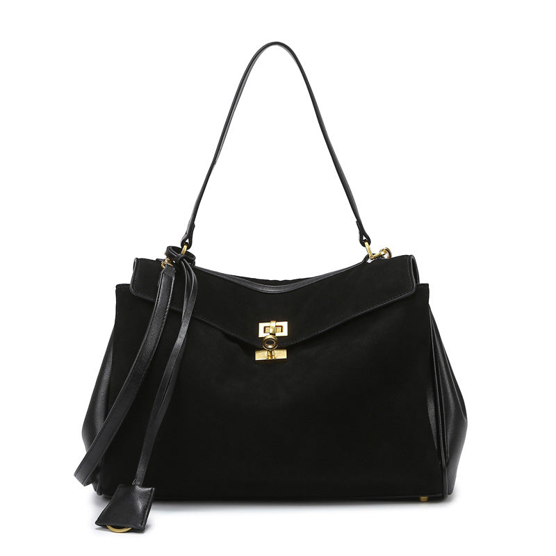THE TRI-COMPARTMENT EXECUTIVE FLAP BAG