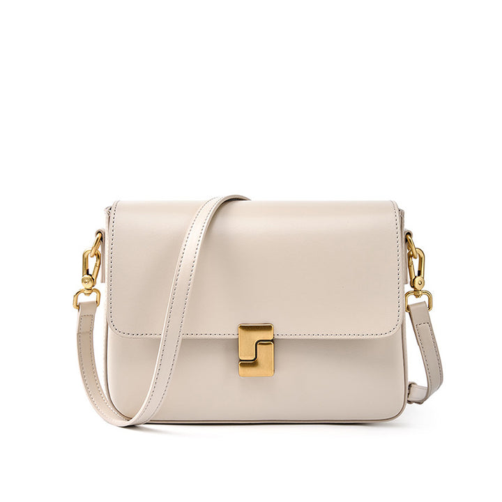 THE DUAL-STRAP VERSATILE FLAP BAG