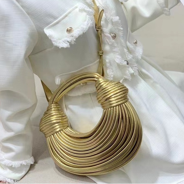 THE GILDED COIL BAG