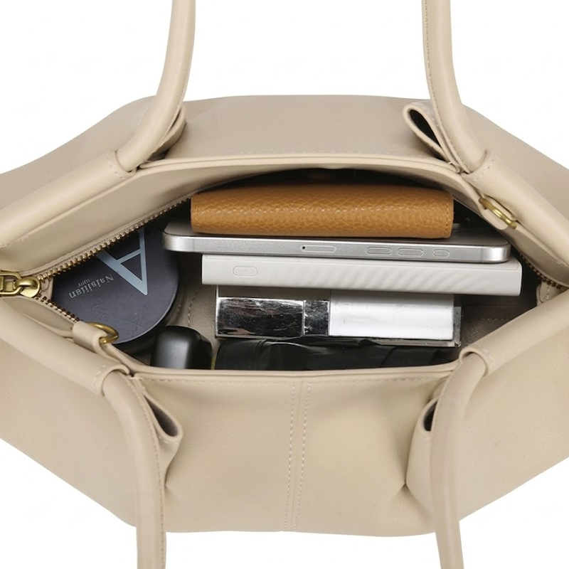 THE SCULPTURAL PLEATED DUMPLING BAG