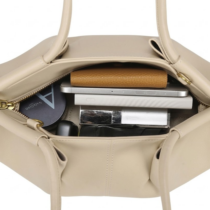 THE SCULPTURAL PLEATED DUMPLING BAG