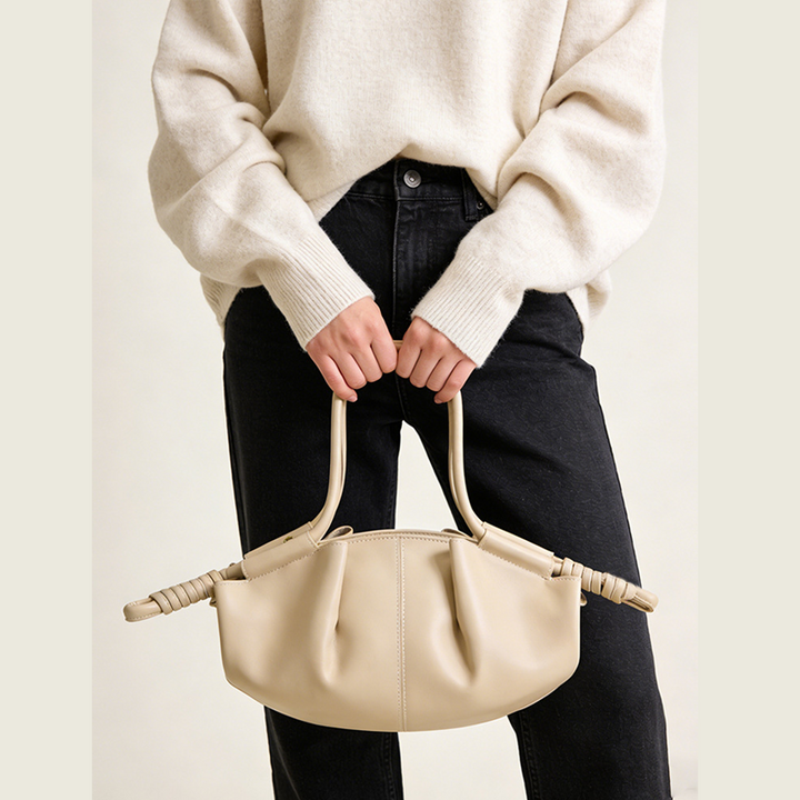 THE SCULPTURAL PLEATED DUMPLING BAG