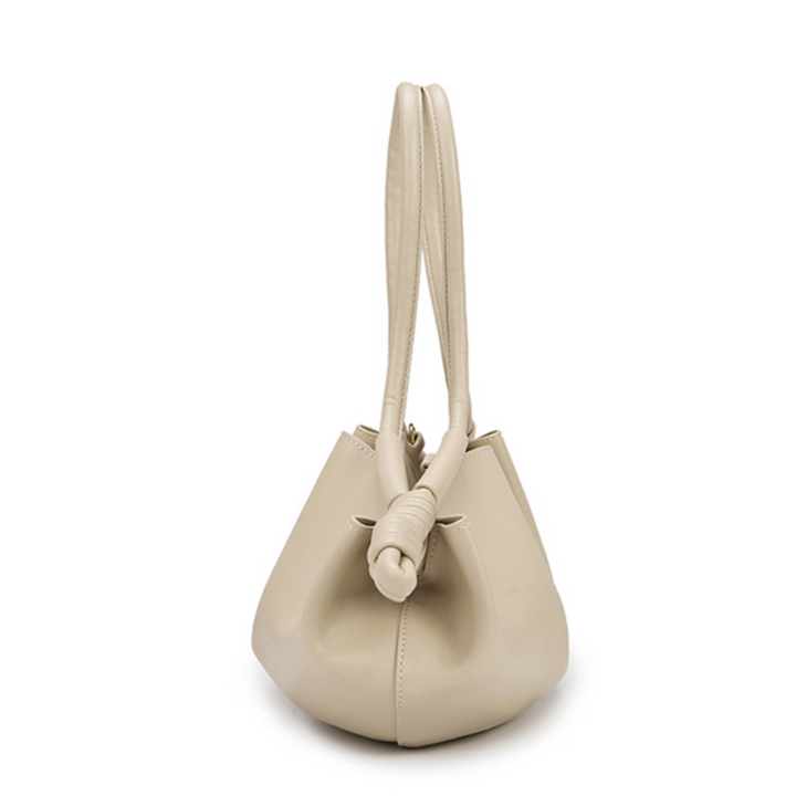 THE SCULPTURAL PLEATED DUMPLING BAG