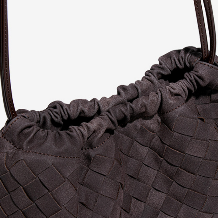 THE FAUX SUEDE DRAWSTRING POUCH