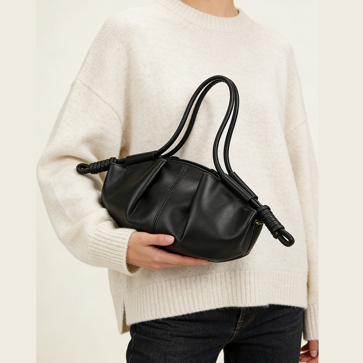 THE SCULPTURAL PLEATED DUMPLING BAG