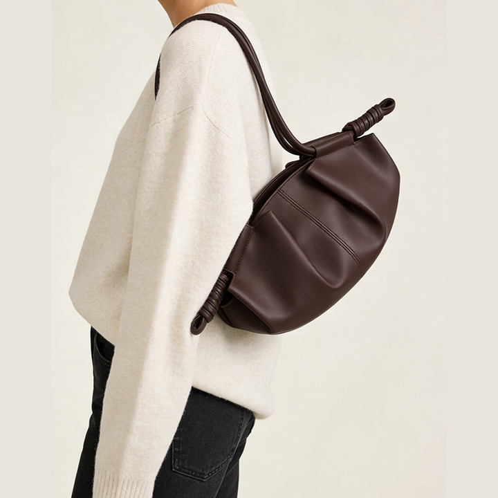 THE SCULPTURAL PLEATED DUMPLING BAG