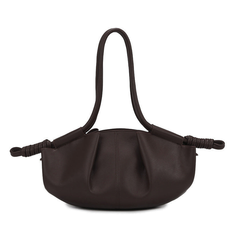 THE SCULPTURAL PLEATED DUMPLING BAG