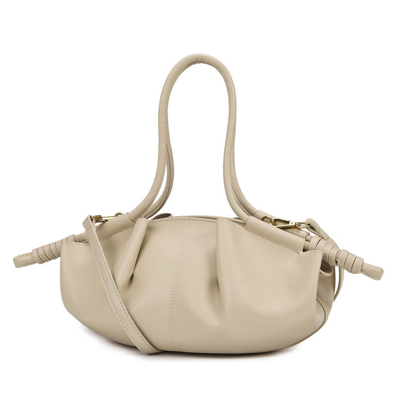 THE SCULPTURAL PLEATED DUMPLING BAG