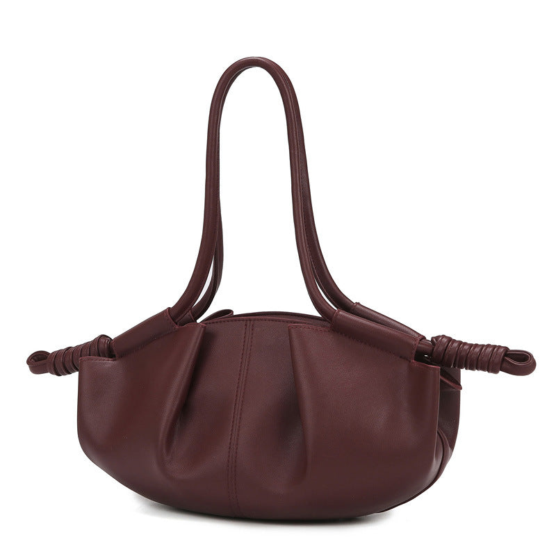 THE SCULPTURAL PLEATED DUMPLING BAG