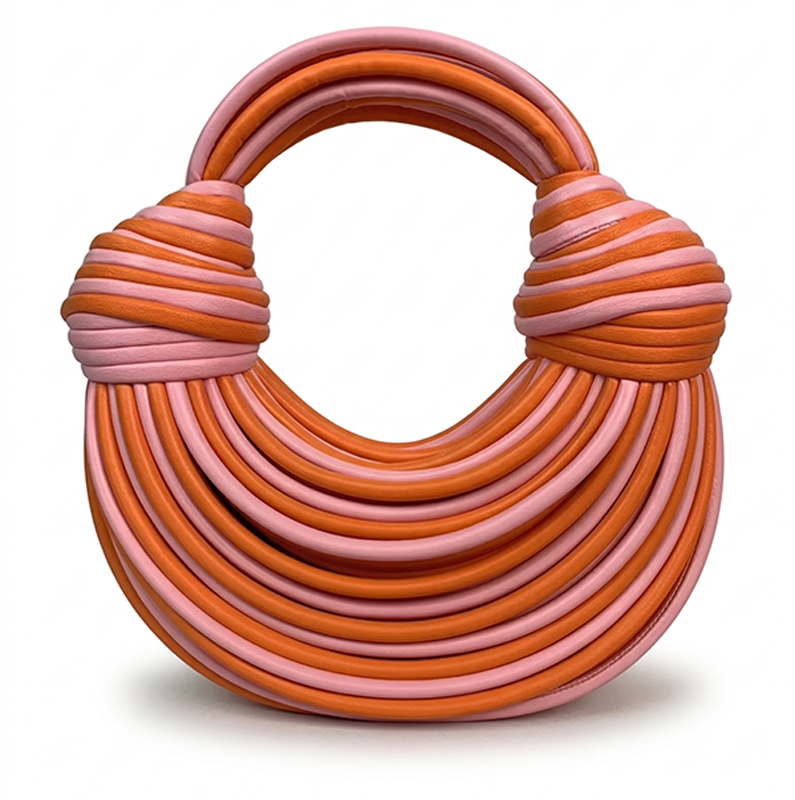 THE GILDED COIL BAG