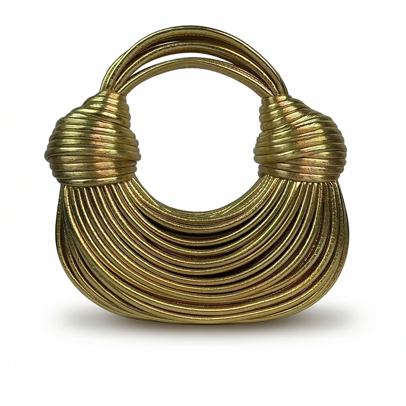THE GILDED COIL BAG
