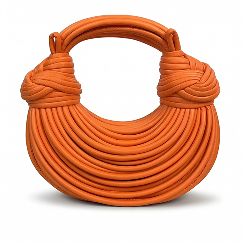 THE GILDED COIL BAG