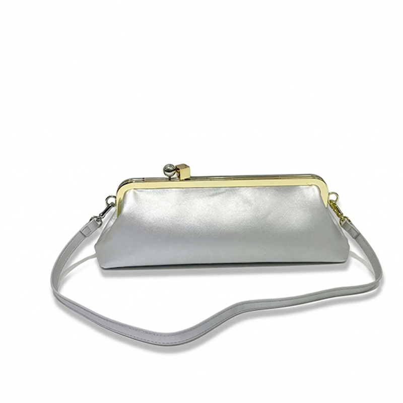 THE VINTAGE ELONGATED CLASP CLUTCH