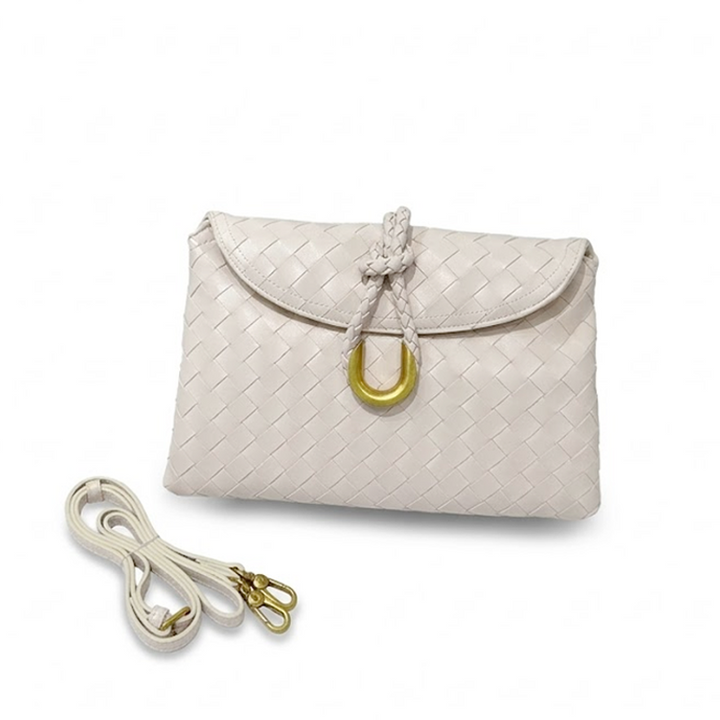 THE REFINED FLAP CLUTCH