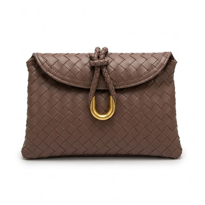 THE REFINED FLAP CLUTCH