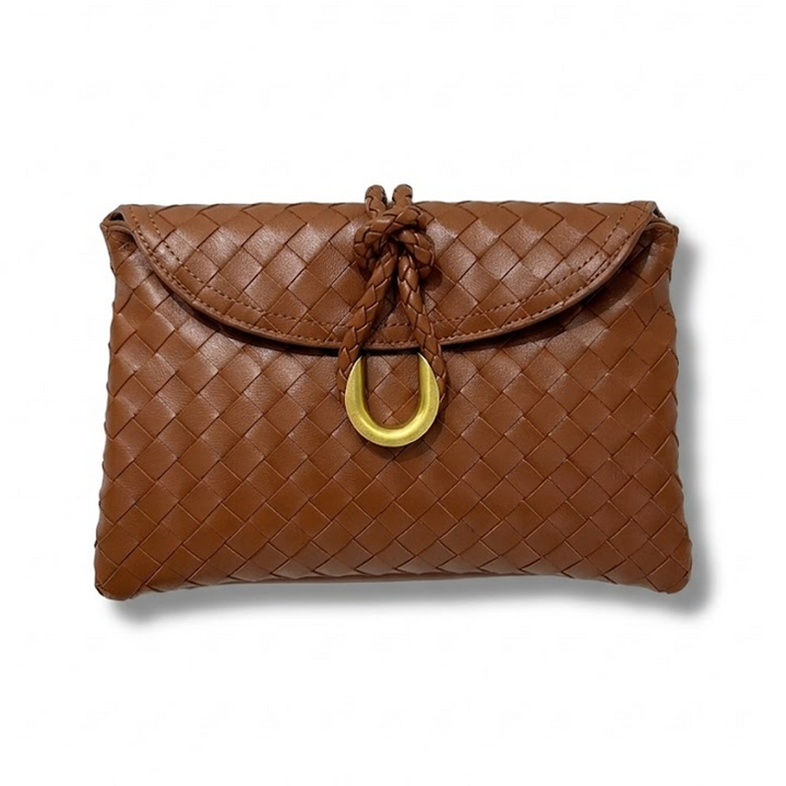 THE REFINED FLAP CLUTCH