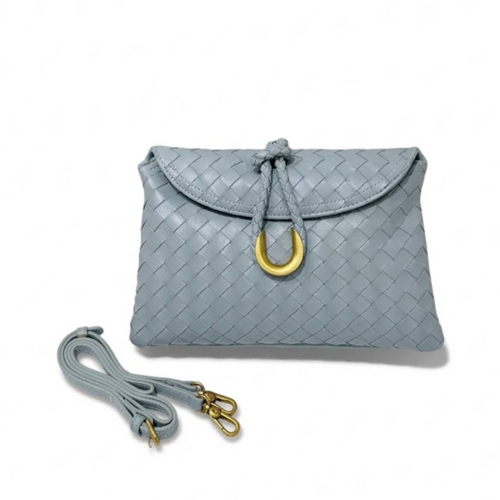 THE REFINED FLAP CLUTCH