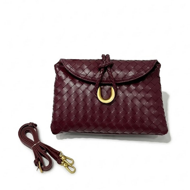 THE REFINED FLAP CLUTCH