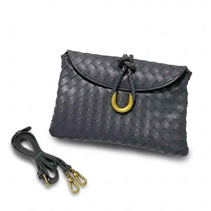 THE REFINED FLAP CLUTCH