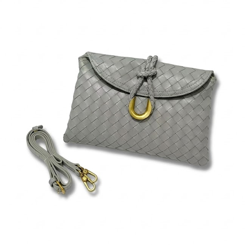 THE REFINED FLAP CLUTCH
