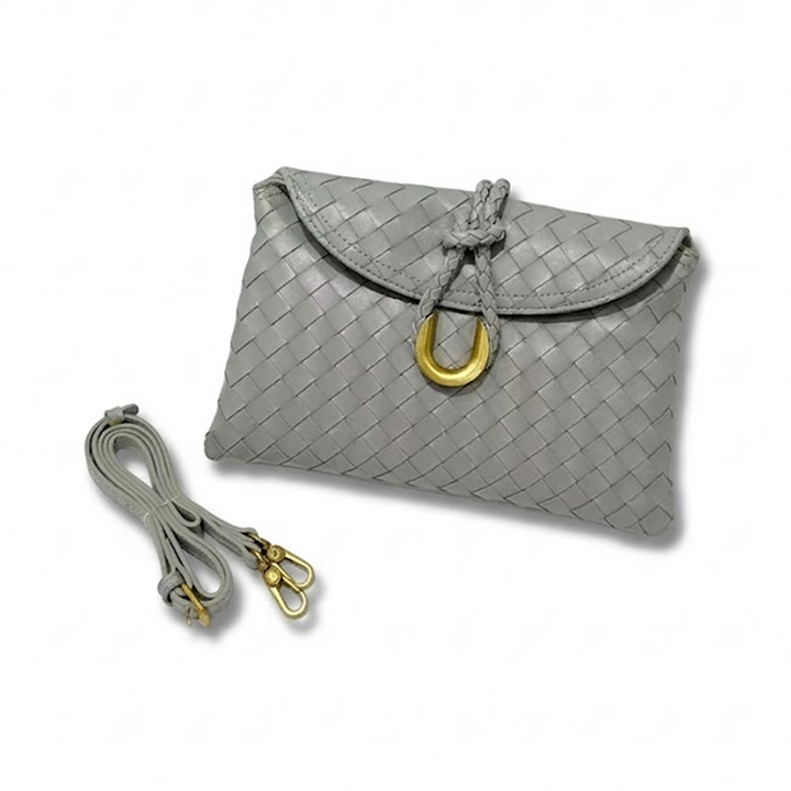 THE REFINED FLAP CLUTCH