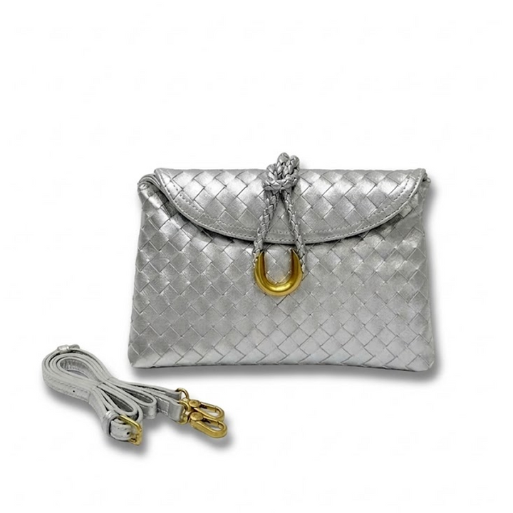 THE REFINED FLAP CLUTCH