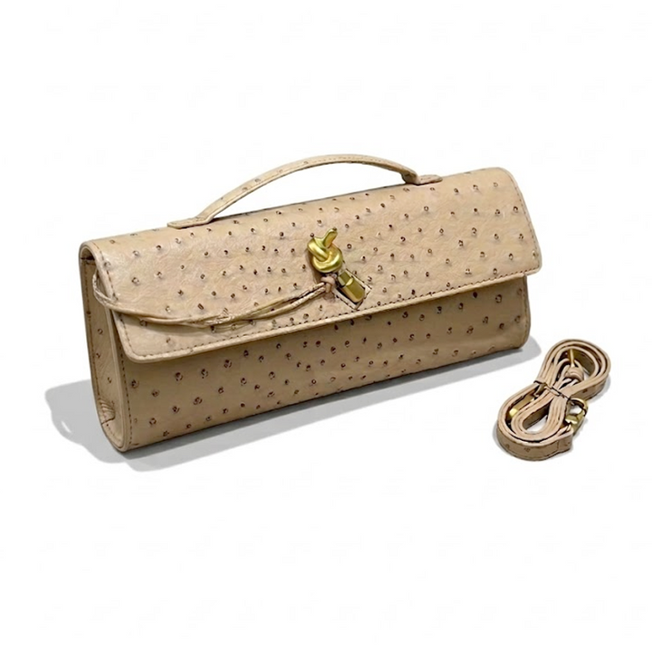 THE KNOT FLAP CLUTCH - Ostrich Embossed