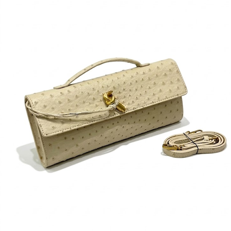 THE KNOT FLAP CLUTCH - Ostrich Embossed