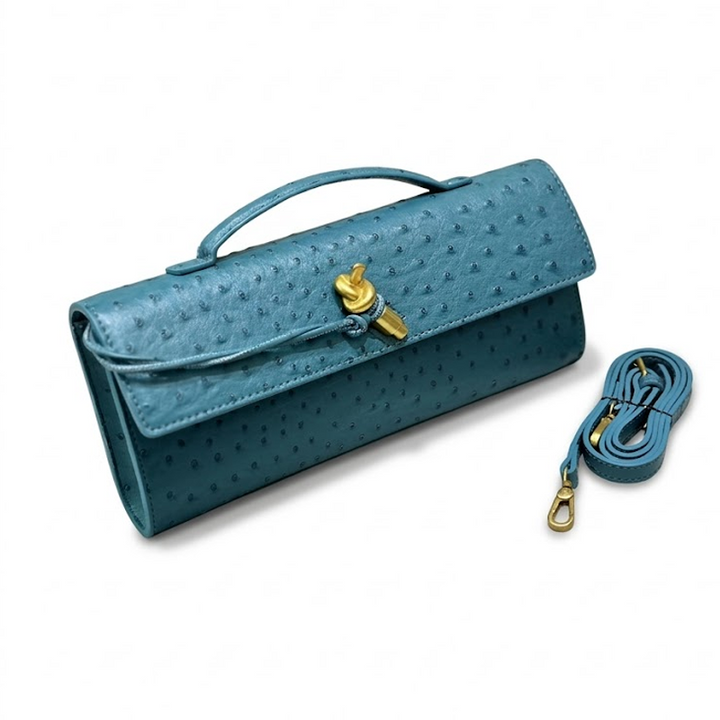 THE KNOT FLAP CLUTCH - Ostrich Embossed