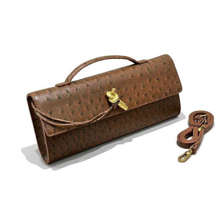 THE KNOT FLAP CLUTCH - Ostrich Embossed