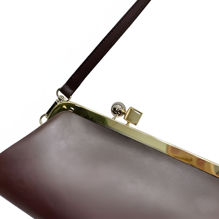 THE VINTAGE ELONGATED CLASP CLUTCH