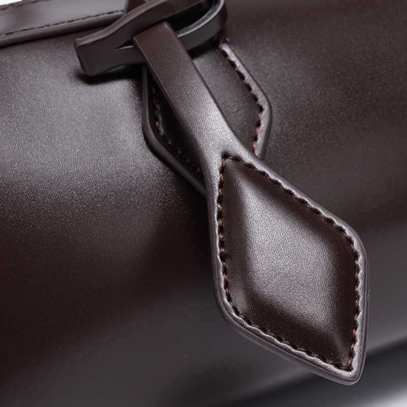 THE REFINED BARREL SHOULDER BAG