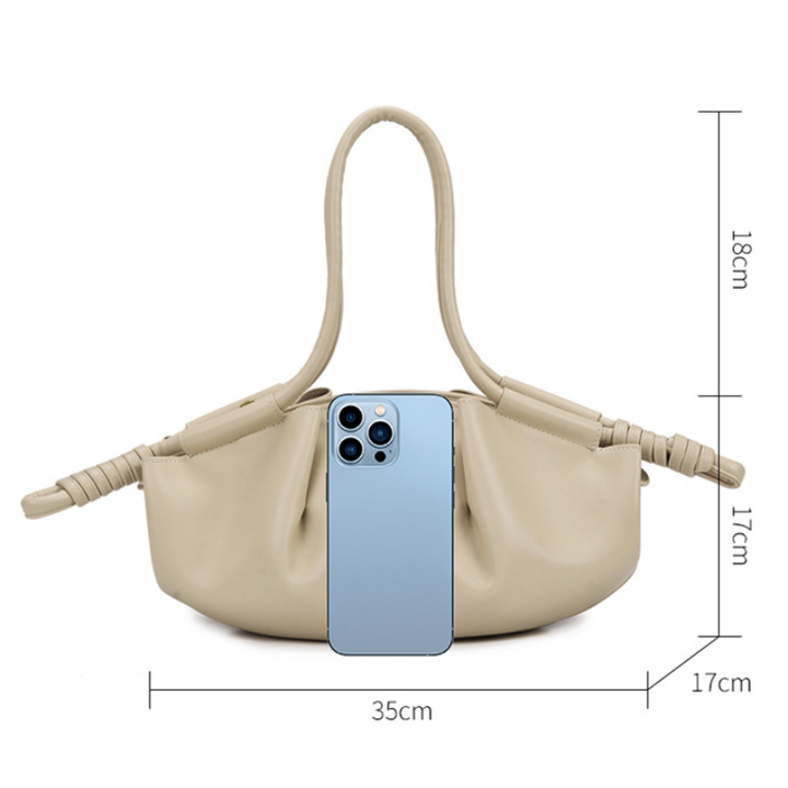 THE SCULPTURAL PLEATED DUMPLING BAG