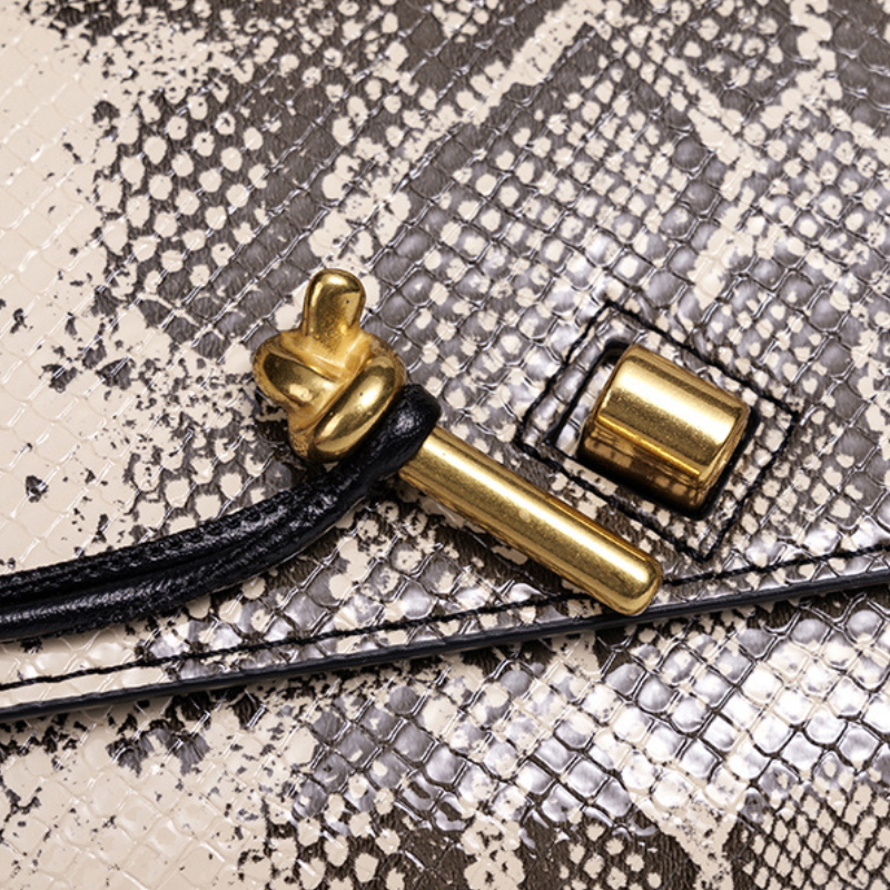 THE KNOT FLAP CLUTCH - WILD