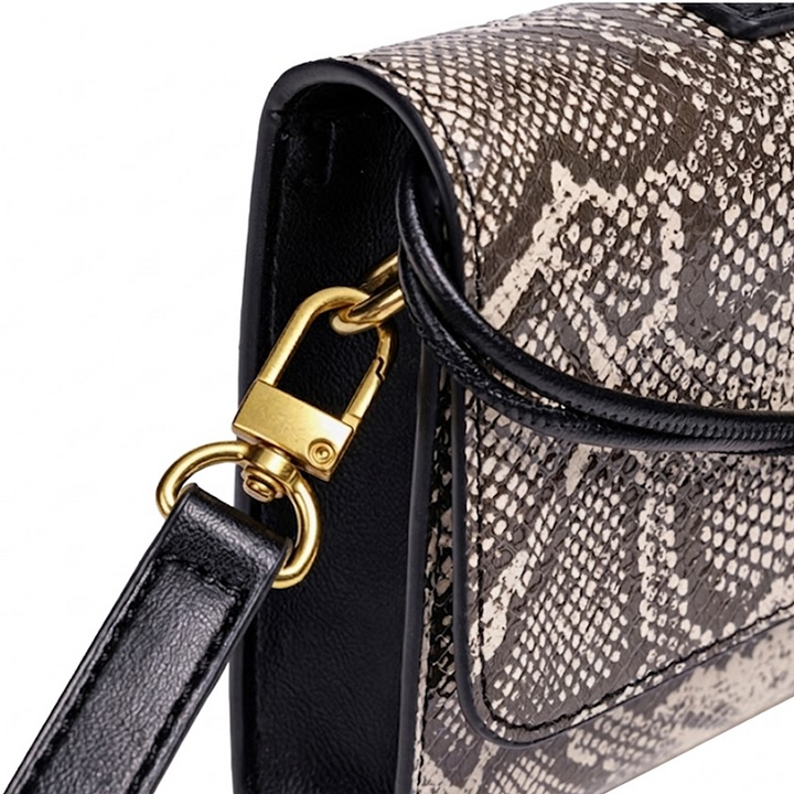 THE KNOT FLAP CLUTCH - WILD