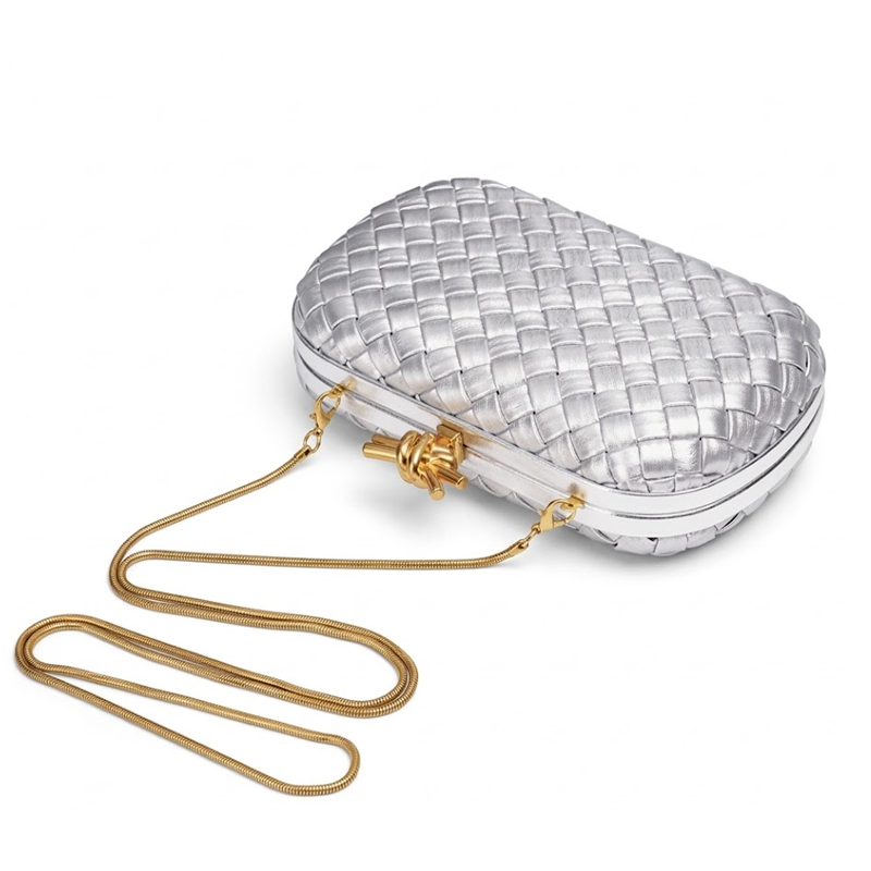 THE REFINED BARREL DUFFEL CLUTCH