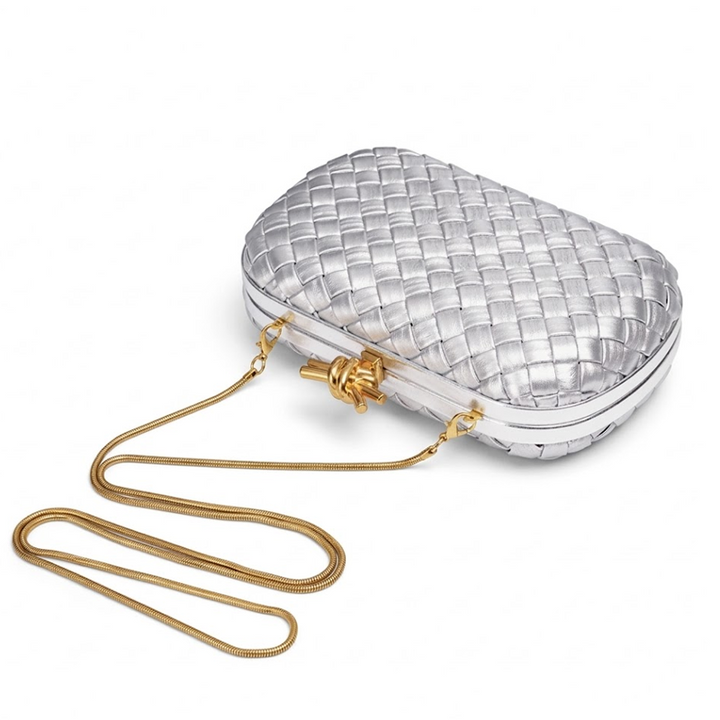 THE REFINED BARREL DUFFEL CLUTCH