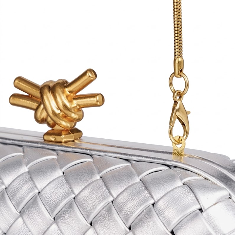 THE REFINED BARREL DUFFEL CLUTCH